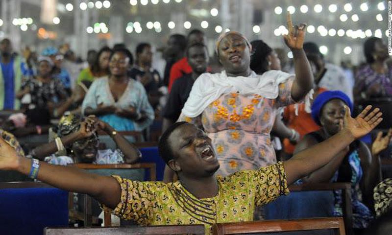 Church members pray