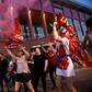 Fans celebrate Liverpool winning the Premier League title