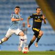 Manchester City's Phil Foden (centre) in action against Arsenal