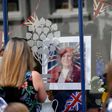 Crowds thronged Vera Lynn's former home of Ditchling in southeast England to catch a glimpse of her funeral cortege