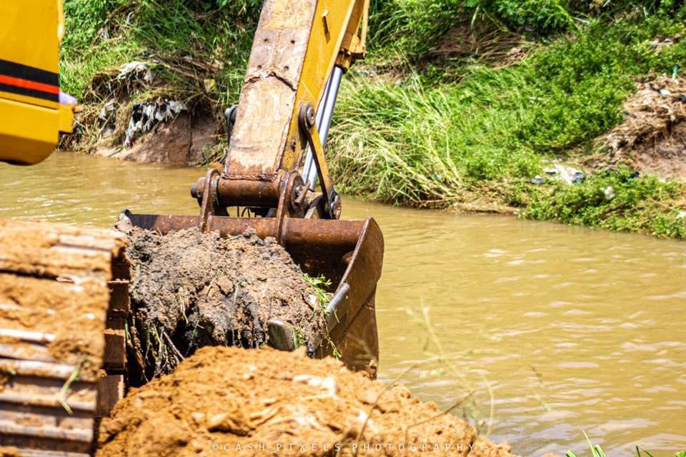 John Dumelo dredges gutter