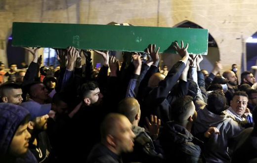 Thousands of mourners attended the funeral of Iyad Hallak