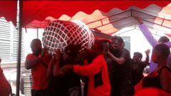 DJ Amess laid to rest in a microphone coffin