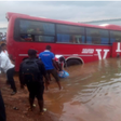 The driver was attempting to park on the pontoon but the bus ended up steering into the river.