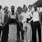 Kenny Sansom (third from right) is pictured with Brazilian great Pele and some of his Arsenal teammates at Highbury Stadium in London in May 1981