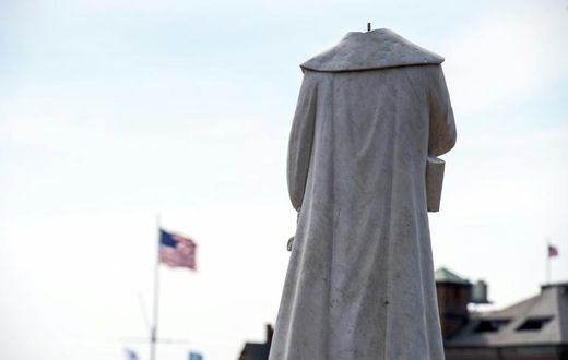 A decapitated statue of Christopher Columbus in Boston, Massachusetts