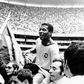 (FILES) Forward Jairzinho is carried by fans after Brazil beat Italy 4-1 in the 1970 World Cup final in Mexico City.