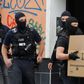 German police carried out dawn raids against mosques and associations in Berlin and other cities on Thursday as it tightened its ban on the activities of Lebanese Shiite militant group Hezbollah