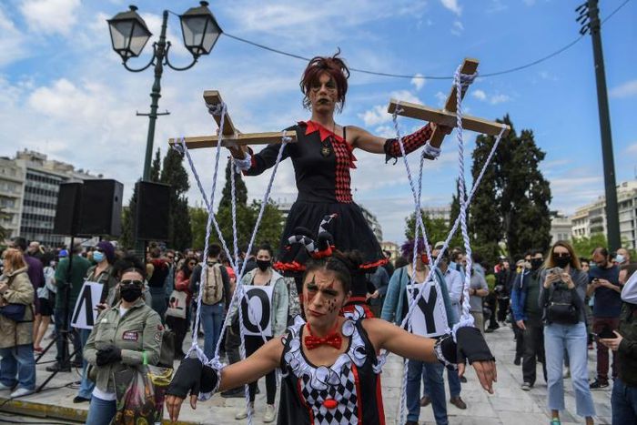 Around 2,000 actors, musicians, puppeteers and other artists gathered outside the Greek parliament to protest on Thursday