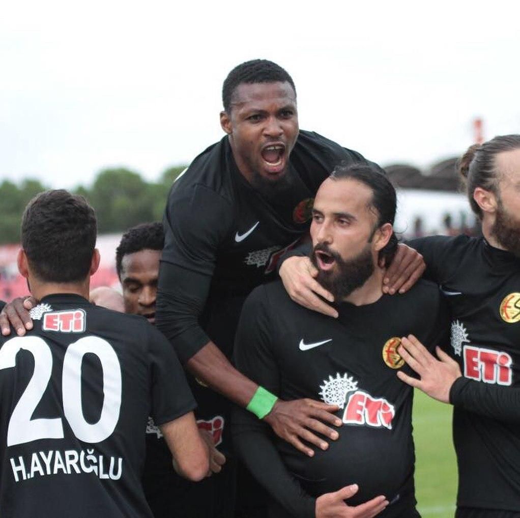 Jerry Akaminko celebrating with his teammates.
