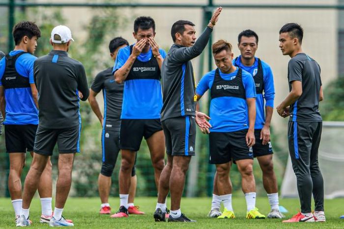 Guangzhou R&F head coach Giovanni van Bronckhorst conducts a squad session last week as Chinese Super League clubs enter a fifth month of pre-season training because of the coronavirus