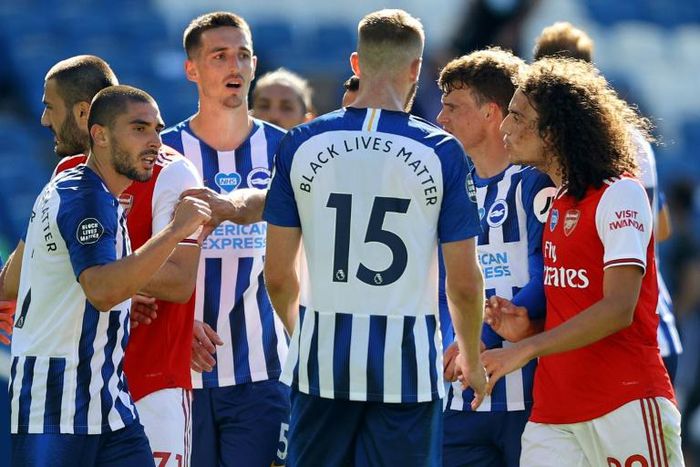 Arsenal and Brighton players clash at the end of their Premier League match