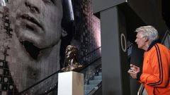 Wim Suurbier looks at a sculpture of former teammate Johan Cruyff at the Johan Cruyff ArenA in Amsterdam in January 2019