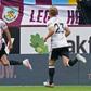 Sheffield United defender John Egan (L) celebrates after equalising at Burnley