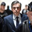 President Emmanuel Macron has called for a probe into claims prosecutors were pressured to speed up the fraud inquiry into Francois Fillon (centre), his rival and then favourite for the 2017 French presidential election