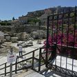 A man walks at the archaeological site of Hadrian's library in Athens as Greece eases lockdown measures taken to curb the spread of  COVID-19