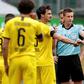 Dortmund are waiting on the fitness of defender Mats Hummels (L) for Tuesday's Bundesliga showdown at home to league leaders Bayern Munich.