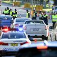 Police in the southern New South Wales border city of Albury check cars crossing from Victoria on July 8 after authorities closed the state border