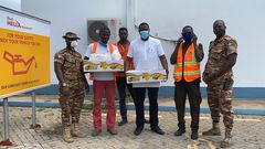 Photos: John Dumelo offers lunch to prisoners weeding on Legon-Shiashie Highway