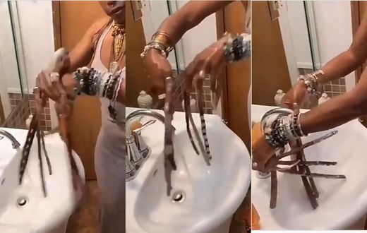 Woman with 16 inches long fingernails demonstrates how she manages to wash her hands (video)