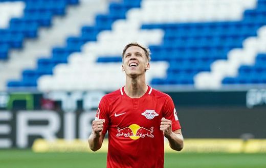 Twice as good: Dani Olmo celebrates scoring his second goal