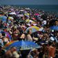 With Britain set for a mini-heatwave beachgoers enjoyed post-lockdown sunshine at Southend on Sea in the south east -- but medical experts warned there is a risk of a coronavirus second wave