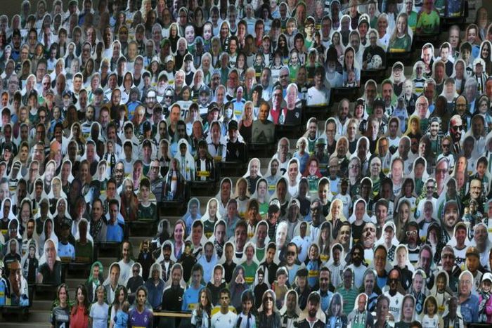 Cardboard cut-outs of Borussia Moenchengladbach fans will fill the team's stadium for Saturday's match against Bayer Leverkusen