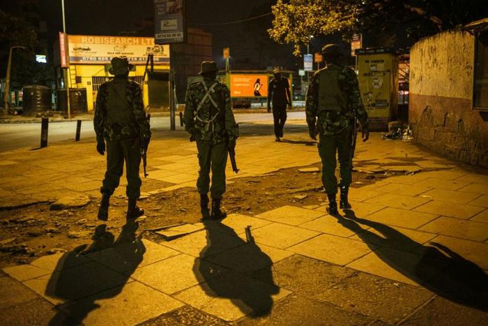 On patrol: Nairobi police during the curfew
