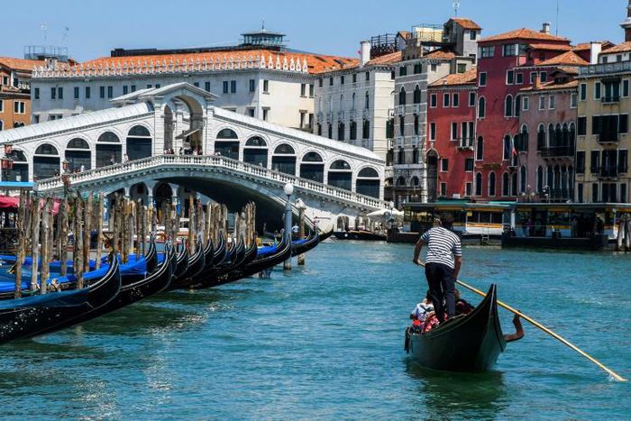 The gondoliers are back in action as tourists flock back to Venice
