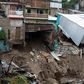 El Salvador bore the brunt of Amanda, which triggered flash floods, landslides and power outages as it ripped into poor Central American states