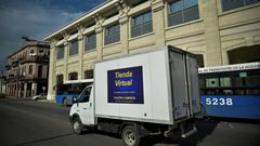 A virtual store truck drives along a street in Havana on June 17, 2020
