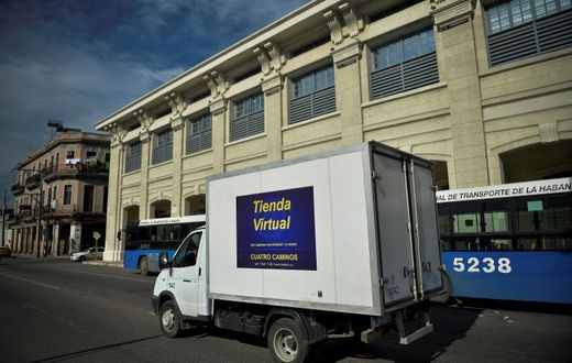 A virtual store truck drives along a street in Havana on June 17, 2020