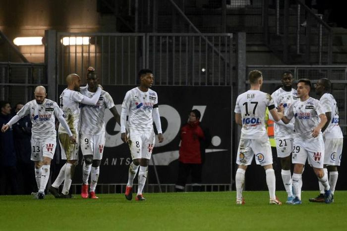 Amiens players celebrate scoring a goal in their 4-4 draw with Paris Saint-Germain in February. The club have since been condemned to relegation after the decision to end the season early due to the coronavirus