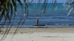People sunbathe in Durres as Albania reopen beaches after weeks of lockdown