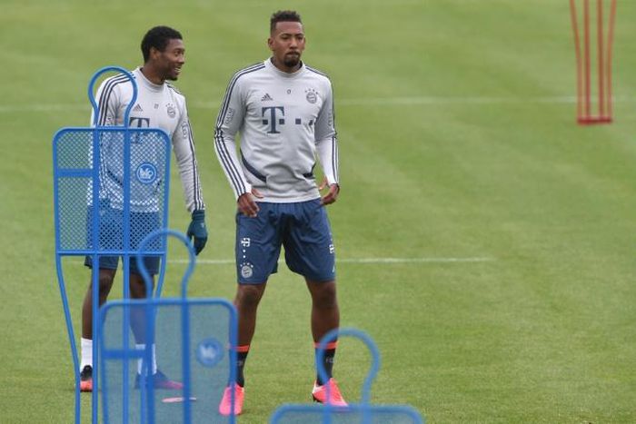Bayern Munich defenders David Alaba (L) and Jerome Boateng in training last week