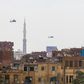 Egyptian air force Apache attack helicopters fly over Cairo on June 2, 2018, as Egyptian President Abdel-Fattah al-Sisi is sworn in for a second four-year term