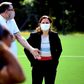 French Sports Minister Roxana Maracineanu talked to the head of the national judo team, Stephane Traineau, during a visit to the national sports training institute on Monday
