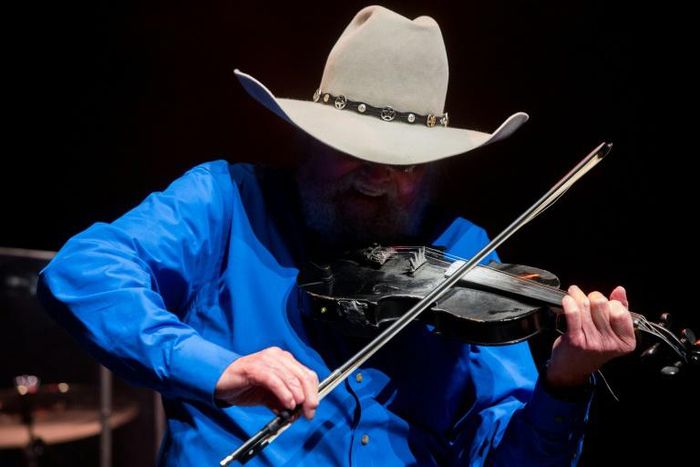 Charlie Daniels, performing here in 2018, has died at 83 following a stroke