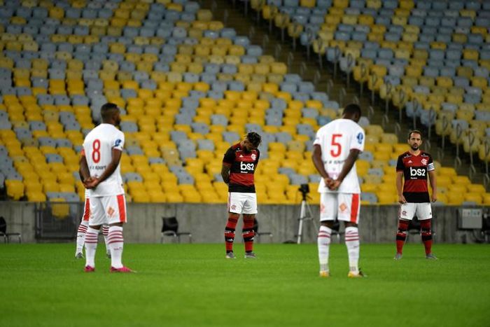 Football in Brazil resumed with Flamengo and Bangu observing a minute's silence for coronavirus victims while fans protested outside the empty Maracana