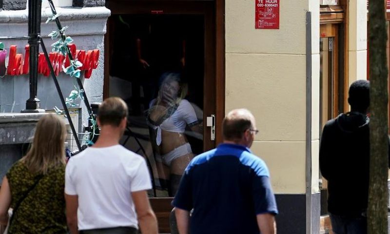 Amsterdam's famous red light district on Wednesday after it reopened its doors
