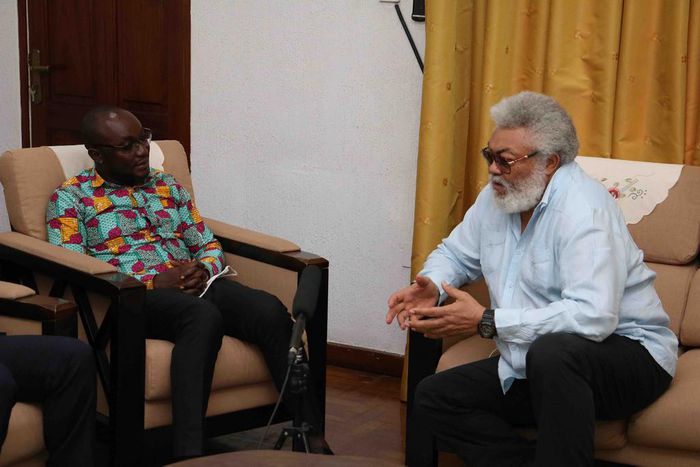 Jerry John Rawlings with Registrar of the Scholarship Secretariat