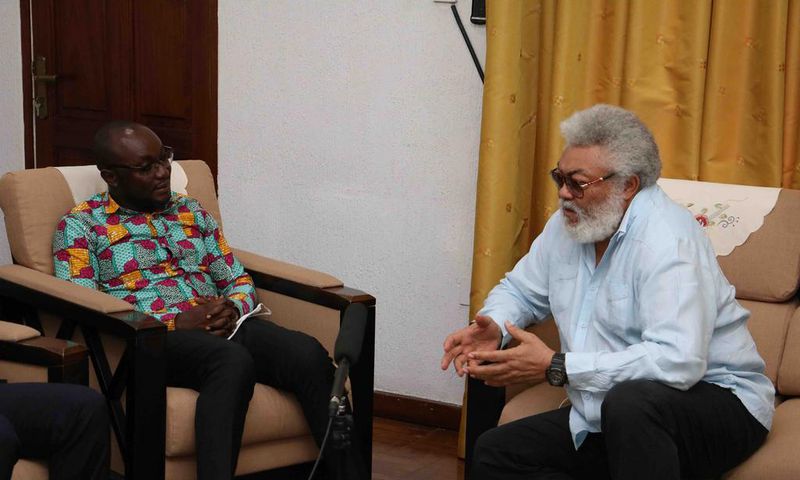 Jerry John Rawlings with Registrar of the Scholarship Secretariat