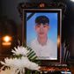 A portrait of 20-year-old Nguyen Dinh Luong, who is feared to have been among the 39 people found dead in a truck in Britain, is kept on a prayer altar at his house in Vietnam's Ha Tinh province on October 29, 2019