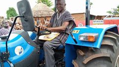 Photos: Bawumia surprises his former primary school teacher with brand new tractor