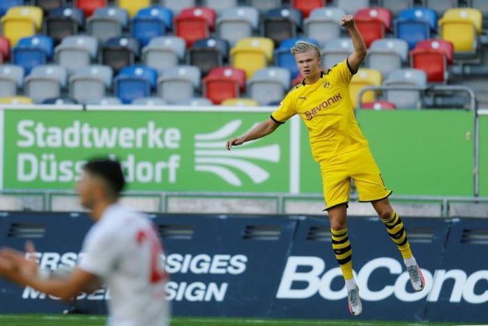Dortmund's Norwegian teen forward Erling Braut Haaland celebrates scoring the 95th-minute winner at Fortuna Duesseldorf on Saturday.