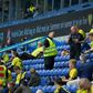 Keep your distance: A steward speaks with a Brondby fan