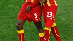 Kevin-Prince Boateng consoles teammate Asamoah Gyan after missing the penalty