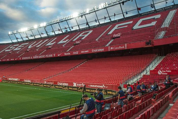 Picture this: Photographers wait for the start of the Spanish League match between Sevilla and Real Betis at the Ramon Sanchez Pizjuan stadium