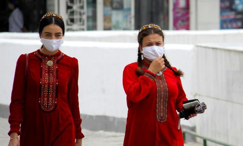 Women wearing masks in Turkmenistan, whose government insists the country is entirely coronavirus-free