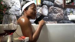 MzBel grants interview from her bathtub